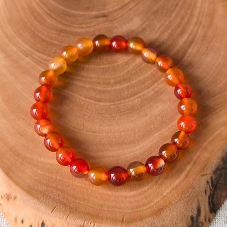 La Cornaline, aux tons orange chaleureux, est une pierre de vitalité et de confiance