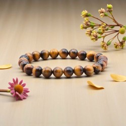 Bracelet boule en Œil de tigre – Protection et confiance