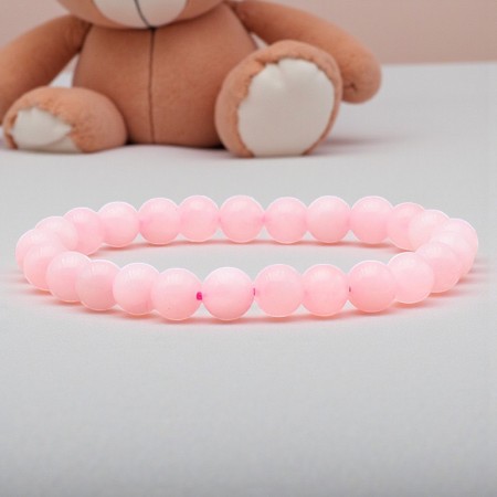 Bracelet boule enfant en Quartz rose du Brésil, pierre naturelle de douceur.
