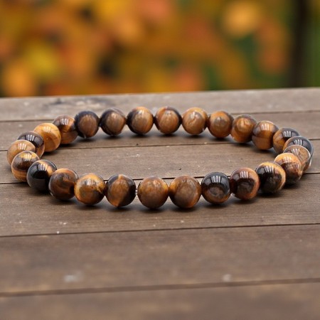 Bracelet boule homme en Œil de tigre d’Afrique du Sud, pierre naturelle de protection et de confiance.