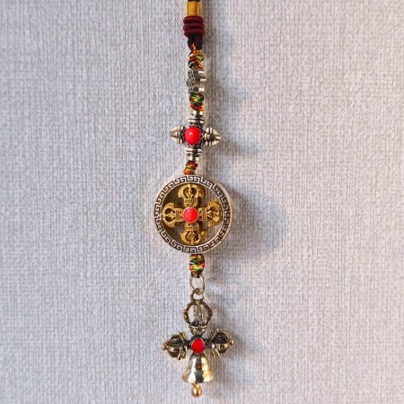 Le double dorje représente la stabilité, la cloche la clarté :