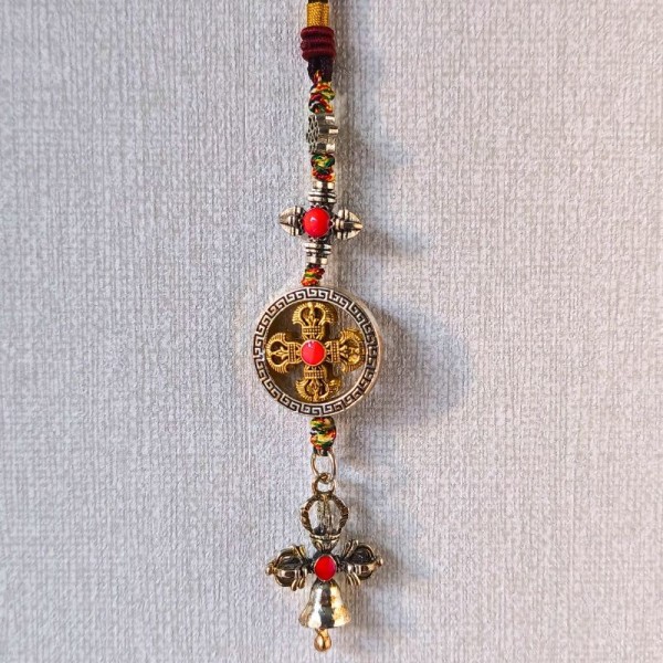 Le double dorje représente la stabilité, la cloche la clarté :