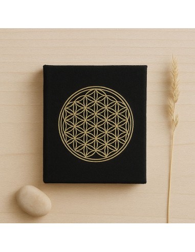 Un carnet fait main en papier lokta naturel, orné de la Fleur de Vie.